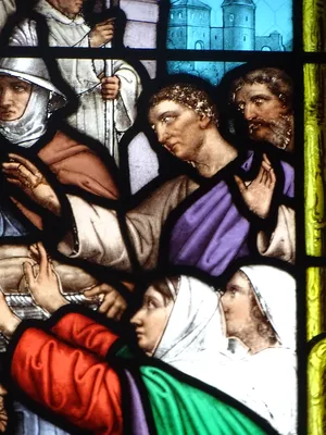 Vitrail Baie 9 : Sainte-Geneviève nourrissant les parisiens dans l'Église Saint-Denis à Cambremer